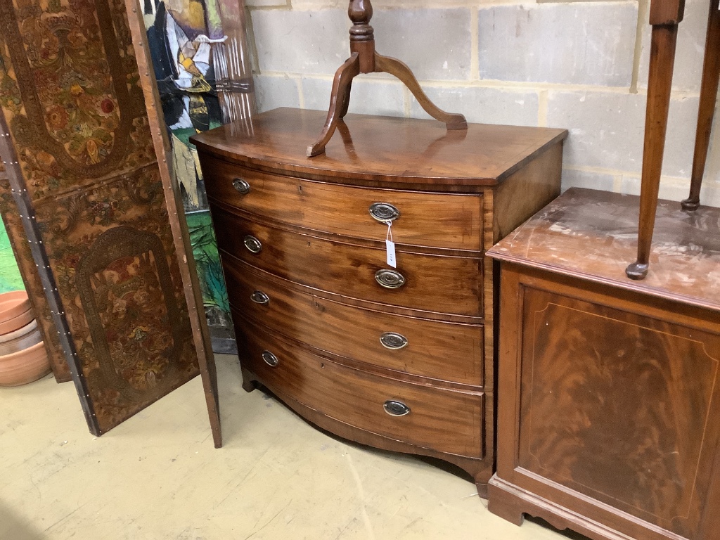 A Regency mahogany bow-fronted chest fitted four graduated long drawers